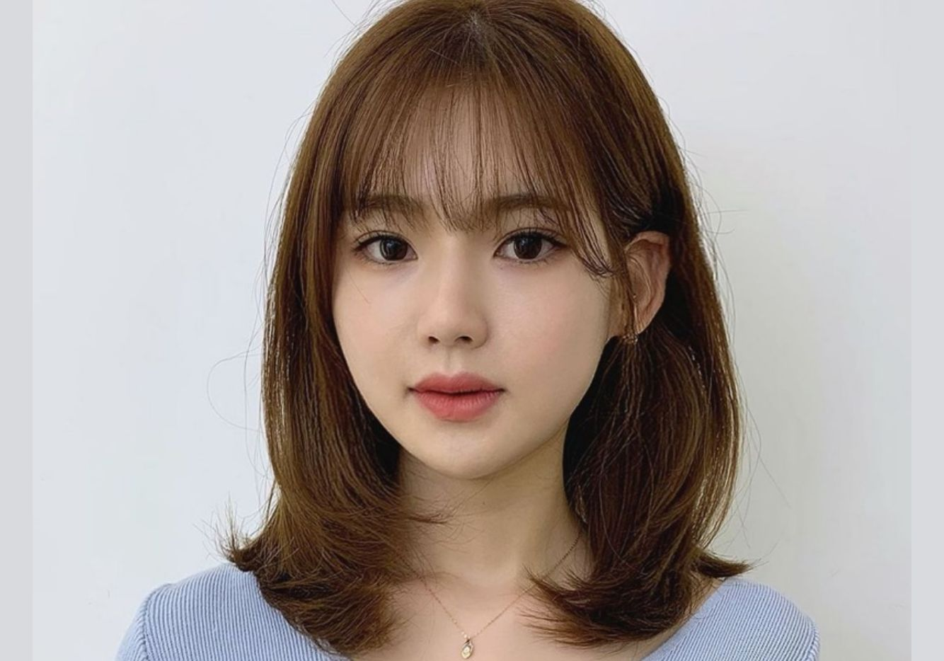 Tóc uốn cụp đuôi